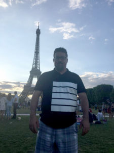 Me, in front of the Eiffel Tower in the late afternoon.