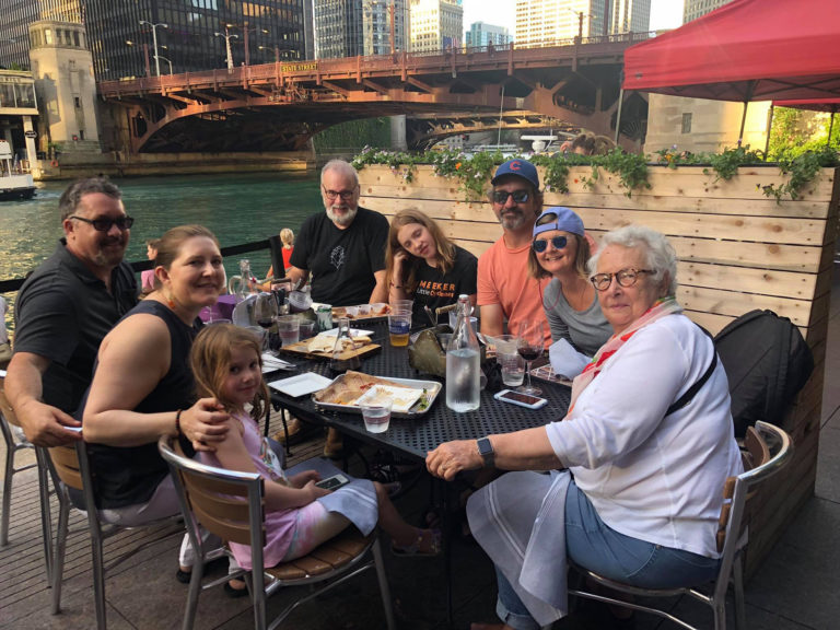 The whole family by the river in Chicago.