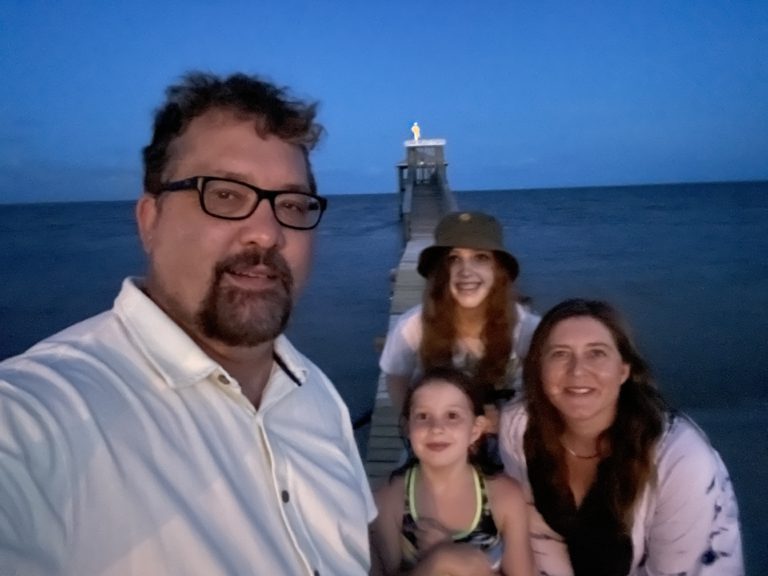Us, in the evening at the Oak Boulevard pier on the Gulf.