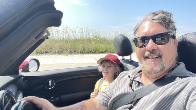 Charlie and me, convertabling down the beach.