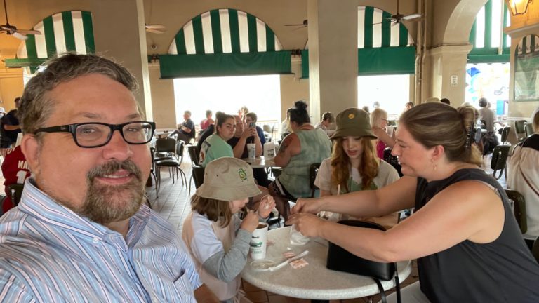Getting beignets at the Café de Monde, New Orleans.