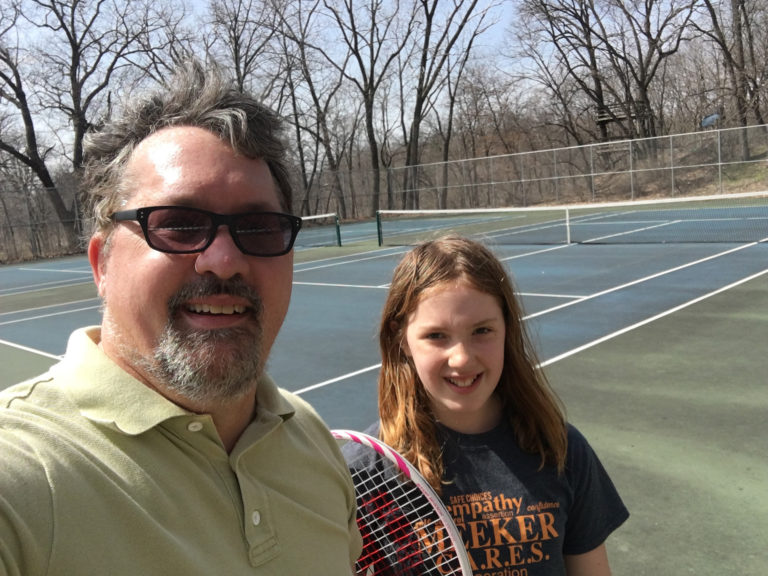 Q and me, playing tennis.
