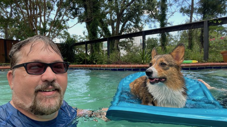 Teaching Rosie to love the pool as much as we do.
