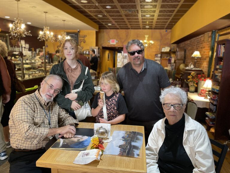 My parents, the girls and I enjoying a chocolate store in Ames.