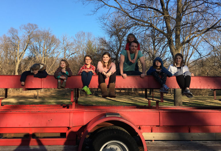 The extended family's kids on the Brookside Park fire truck.