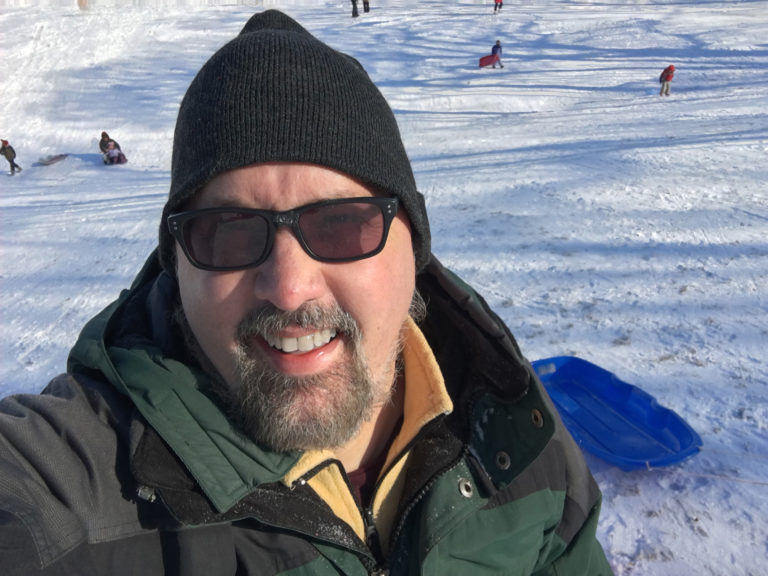Me, sledding with the kids on Rocket Hill in Ames.