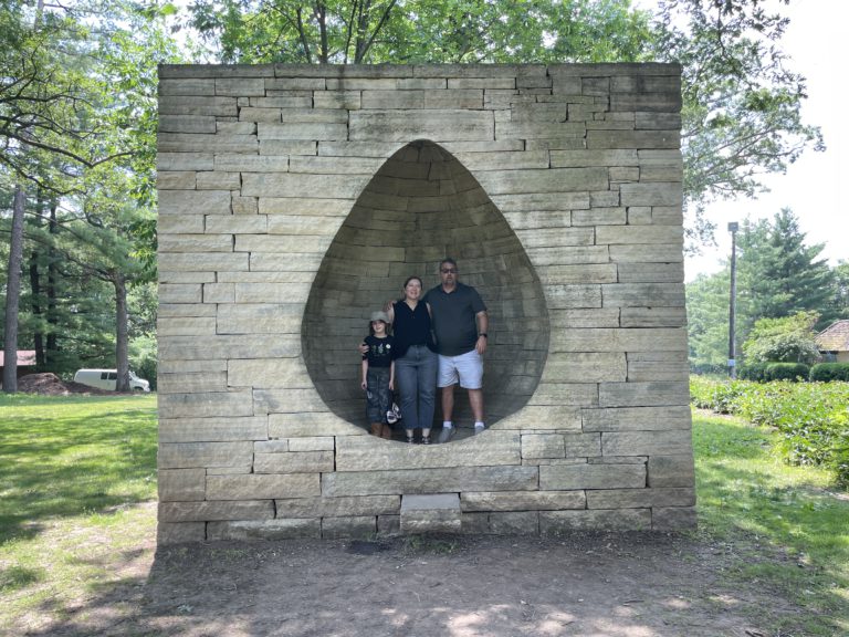 The family in the park behind the Des Moines Art Museum.