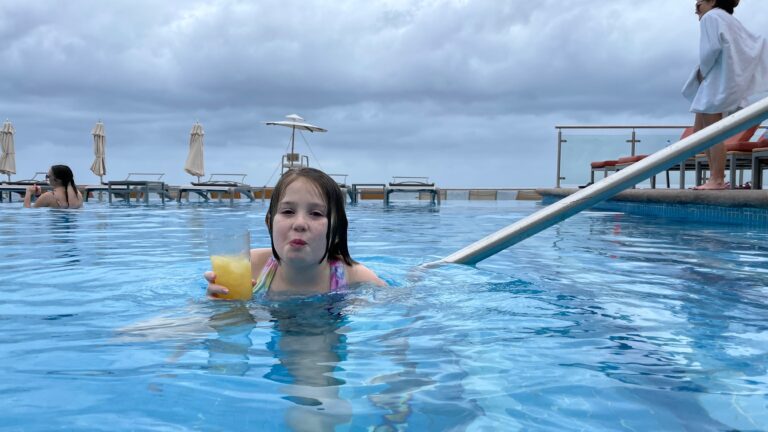 Charlie enjoying the pool, in Cozumel.