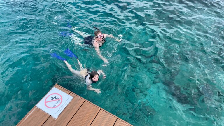 Alisha and Charlie, snorkeling in the Caribbean.