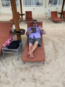 Reading on the beach in Cozumel.