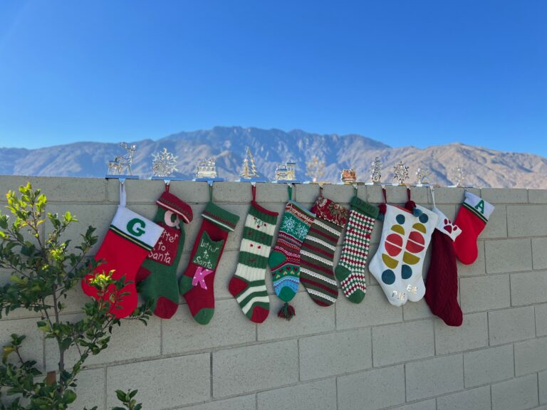 Our Christmas stockings below California mountains.