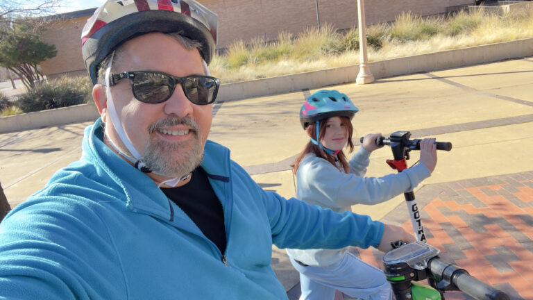 Charlie and me on scooters, on the TTU campus.